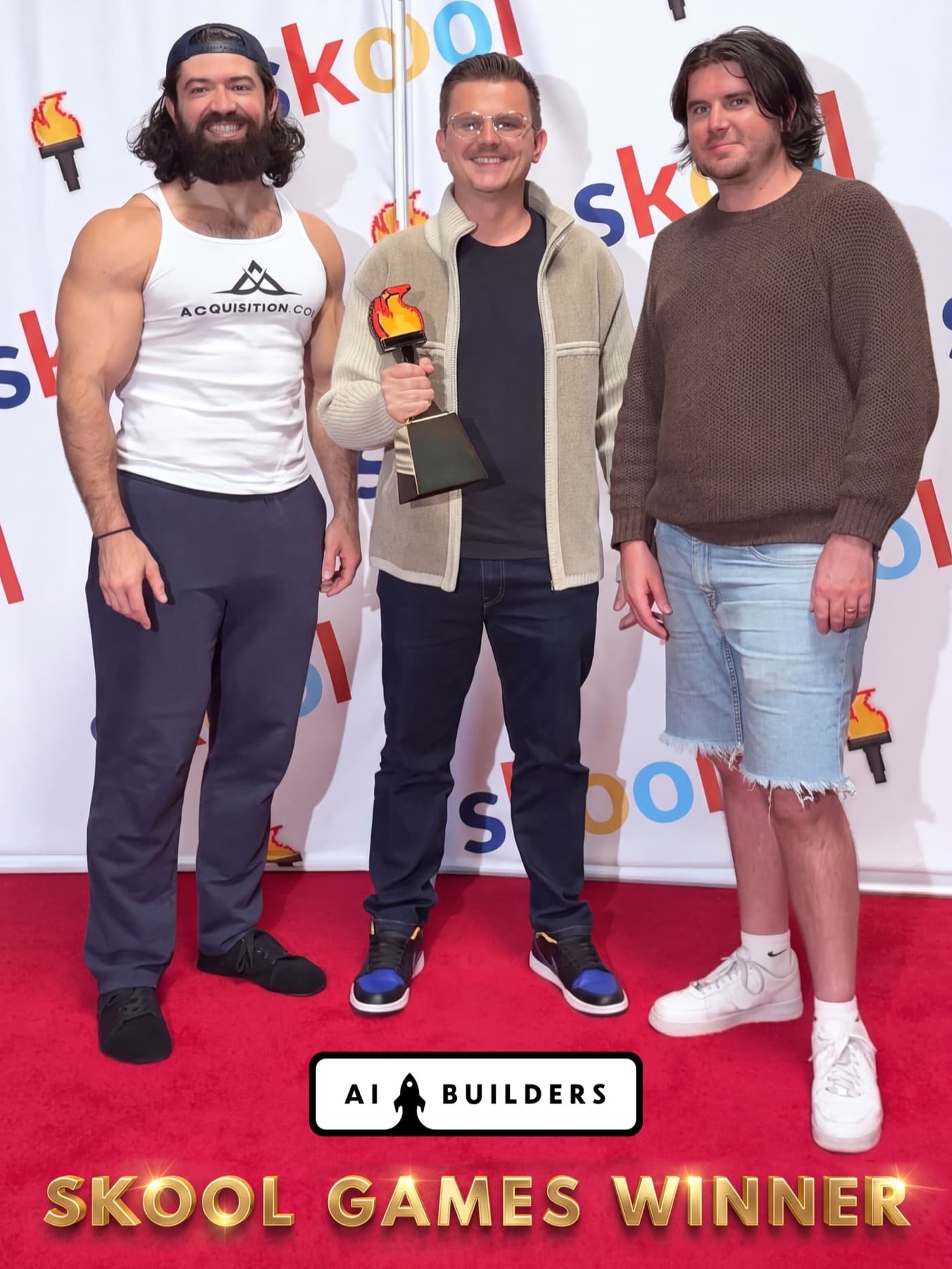 Marcin Teodoru with Alex Hormozi and the Skool Games award
